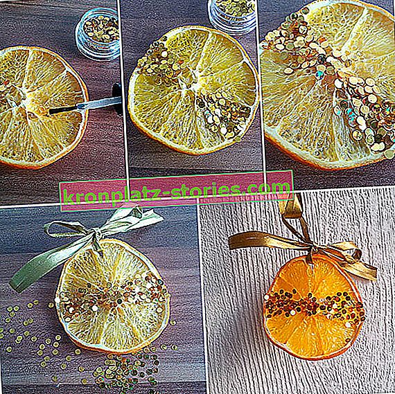 Goldene Dekoration von getrockneter Orange für den Weihnachtsbaum